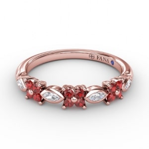 A floral diamond and ruby wedding band from Fana.